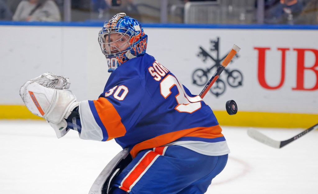 Ilya Sorokin #30 of the New York Islanders deflects the puck during the second period when the New York Islanders played the San Jose Sharks Tuesday, October 21, 2025 at UBS Arena in Elmont, NY.
