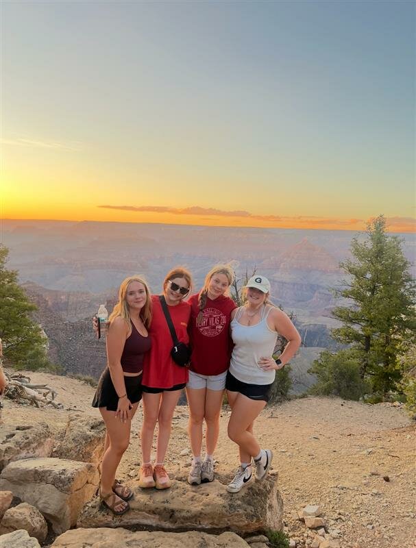 Blythe Thompson, Allison Griffith, Lily Stout and Lexi Hoskin stand in front of the Grand Canyon while hosting students from Ireland in Tempe for 3 weeks in the summer of 2025.