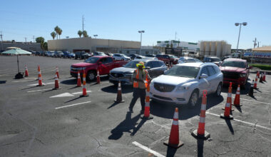Hundreds of vehicles line up as patrons wait to pick up food at St. Mary