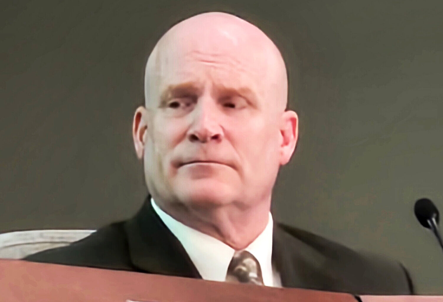 Dr. Curtis Finch, Deer Valley Unified School District superintendent, sits on the governing board dais on Oct. 14, 2025, in Phoenix.