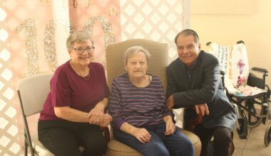 Rae Merritt with her two children: Debra Gaskins and Cleve Merritt.