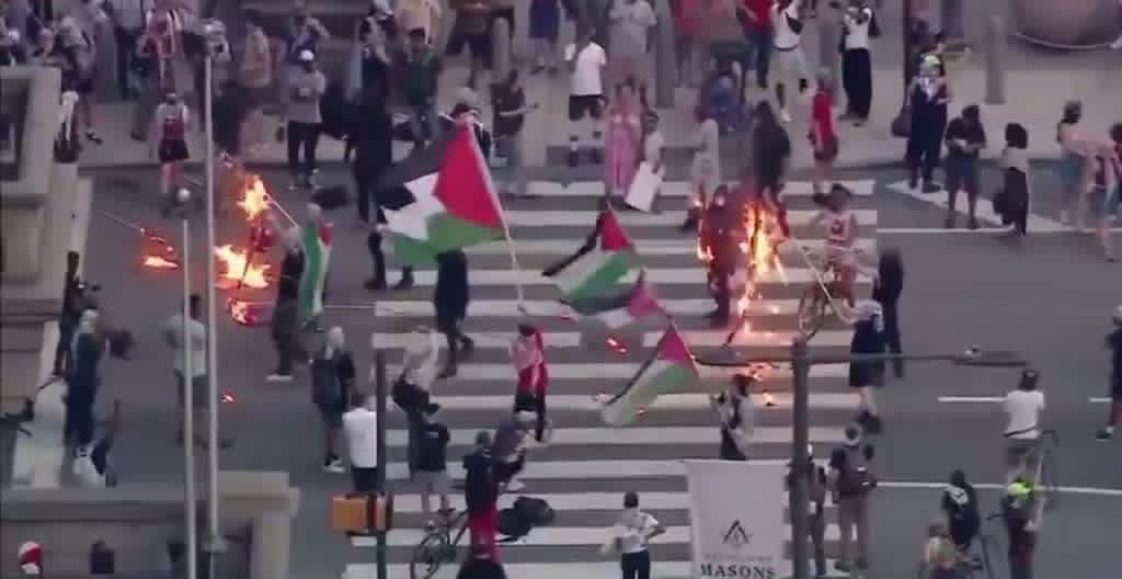 Pro-Hamas Protesters Burn Dozens of American Flags Outside Philadelphia City Hall