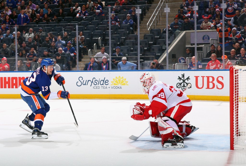 Mathew Barzal #13 of the New York Islanders scores a second period goal against Cam Talbot #39 of the Detroit Red Wings at UBS Arena on October 23, 2025 in Elmont, New York. 