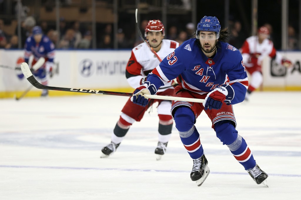 Mika Zibanejad #93 of the New York Rangers chases the puck during the third period against the Carolina Hurricanes at Madison Square Garden on November 04, 2025 in New York City.
