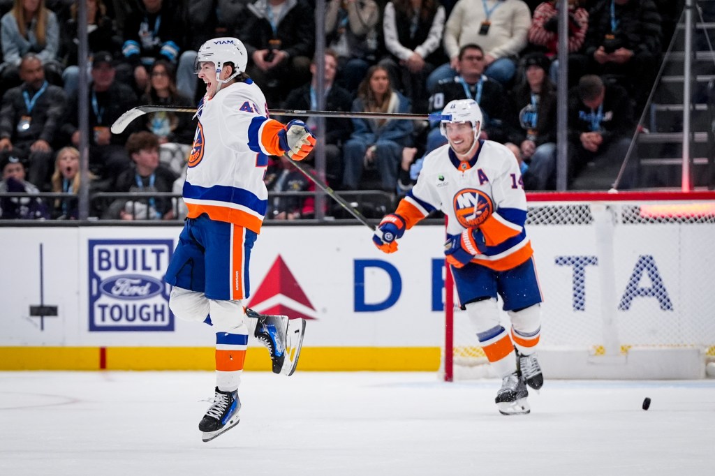 Matthew Schaefer #48 of the New York Islanders celebrates a goal during overtime against the Utah Mammoth at Delta Center on November 14, 2025 in Salt Lake City, Utah.