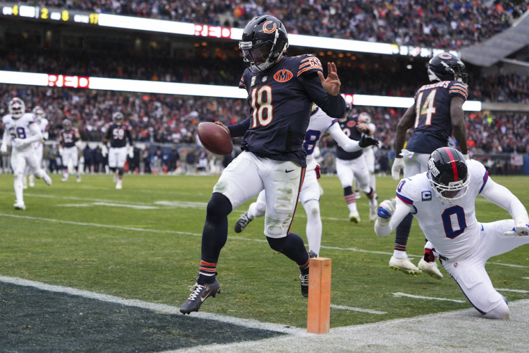Chicago Bears quarterback Caleb Williams runs the ball into the end zone during a game against the New York Giants on Nov. 9, 2025 in Chicago.