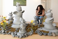 Alexis Compan admires artwork by artist Minji Kang-Watrous at Nostalgia and Noise, an...