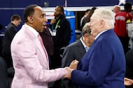 ESPN’s Stephen A. Smith (left) talks with Dallas Cowboys owner and general manager Jerry...