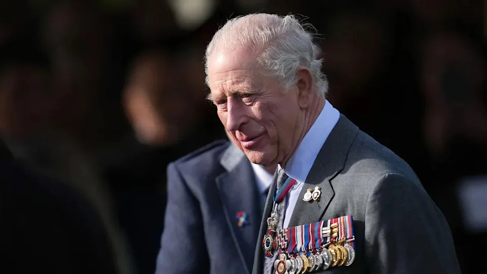 King Charles walks around at a dedication ceremony in Staffordshire.