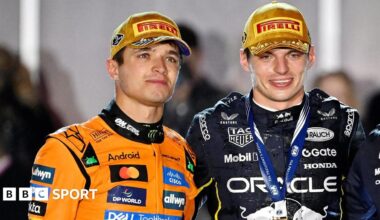 Lando Norris (left) stands alongside Max Verstappen (right) after the Las Vegas Grand Prix