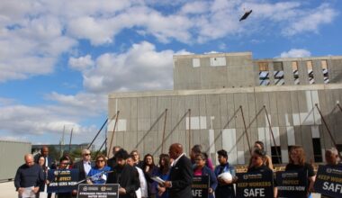 A photo of stakeholders at an active construction site