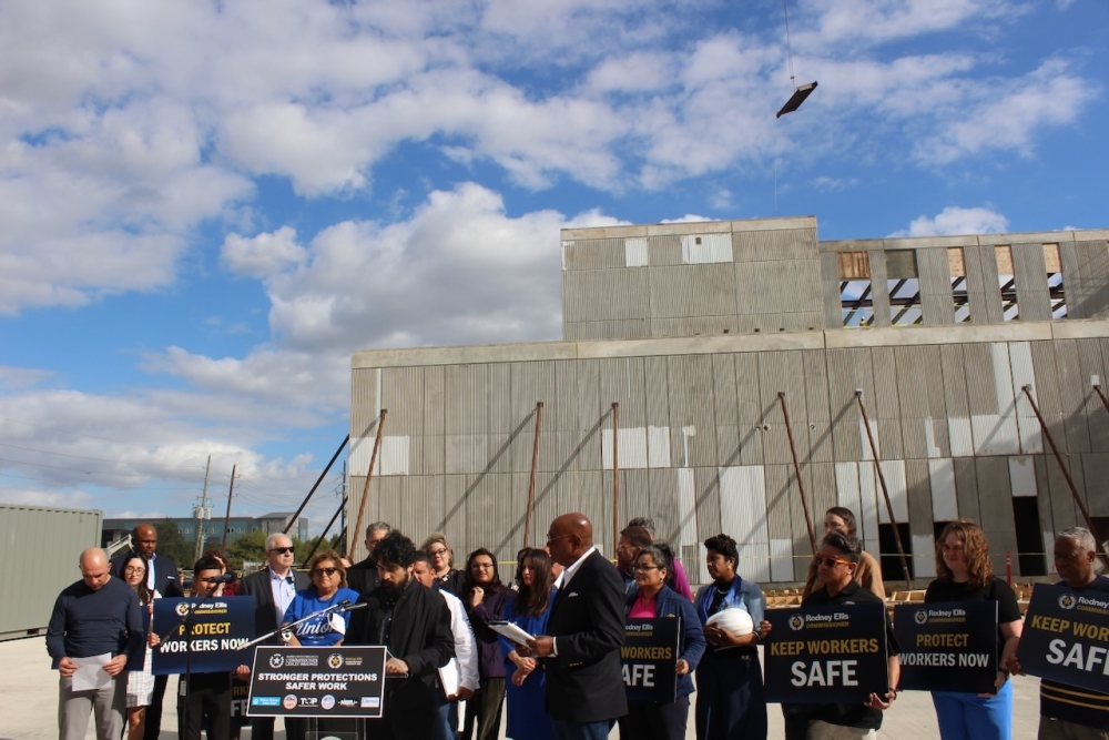 A photo of stakeholders at an active construction site