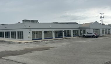 The exterior of a school district technology building is seen on a cloudy day in Live Oak, Texas.