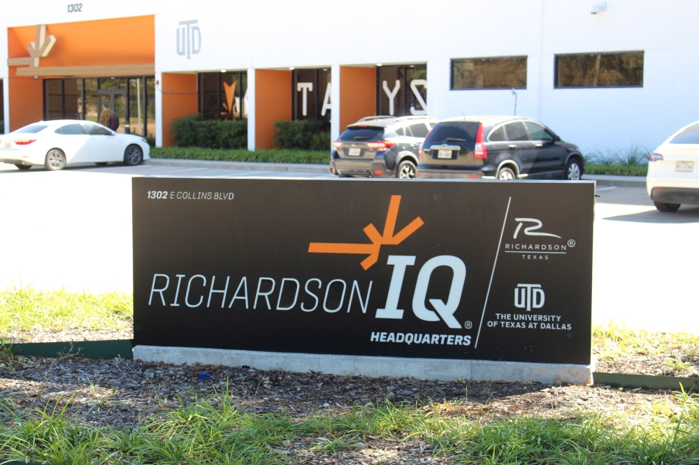a sign for the Richardson Innovation Quarter building