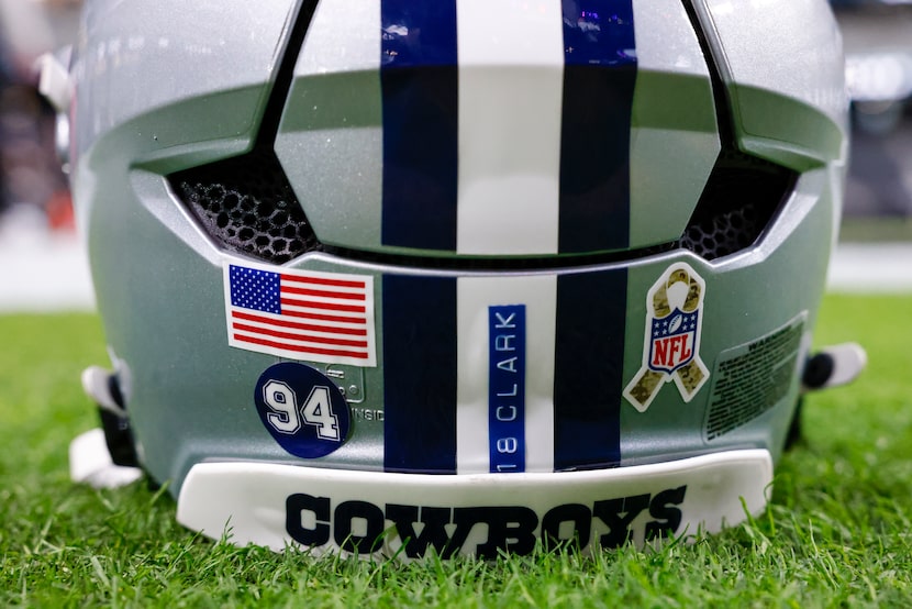 A number 94 sticker is seen on a Dallas Cowboys helmet in memory of defensive end Marshawn...