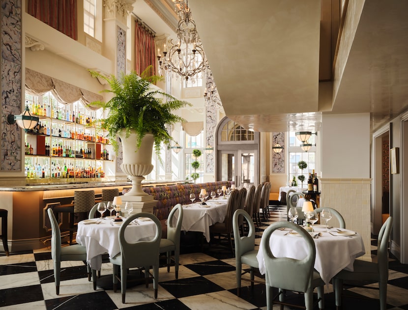 The bar on the left at Mister  Charles offers a thrilling view of Dallas people and Dallas...