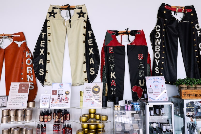 Chaps made by Arthur Porter, Dallas Designing Dreams co-founder, hang on display at...