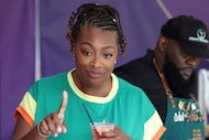 Celebrity chef Tiffany Derry reacts as she taste-tests her premium drink "Go for the Goal"...