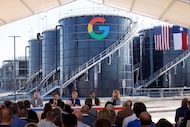 Alphabet and Google CEO Sundar Pichai, second from right, speaks during a news conference to...
