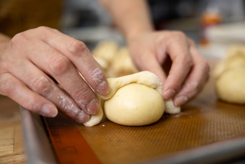 Maria Becerra prepares the “huesos” for the pan de muerto, the staple bread for Dia de...