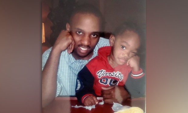 Victim Randy Blanche Jr., right, as a child with his father Randy Blanche Sr.