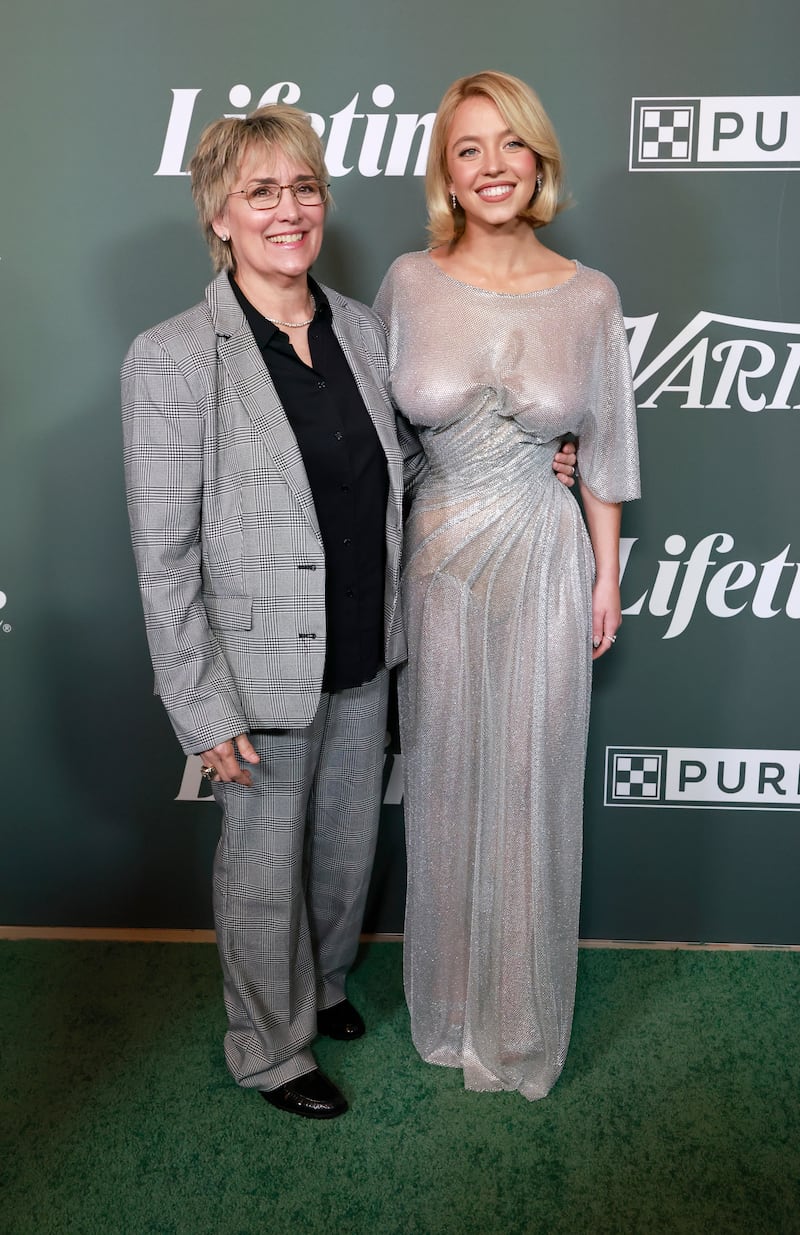 BEVERLY HILLS, CALIFORNIA - OCTOBER 29:  (EDITOR’S NOTE: Image contains partial nudity.) Christy Martin and Sydney Sweeney attend Variety's 2025 Power Of Women at The Beverly Hills Hotel on October 29, 2025 in Beverly Hills, California.