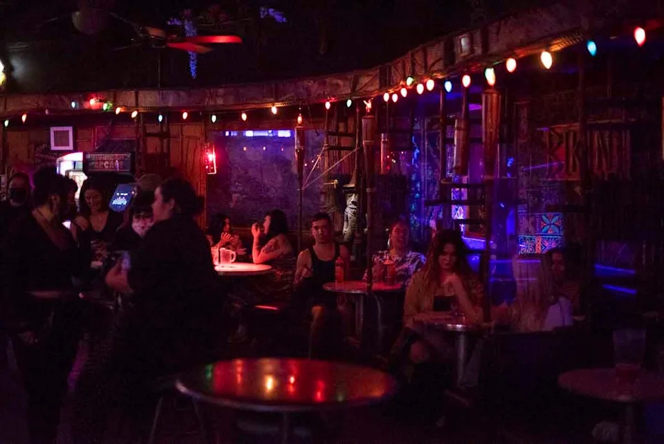 Patrons drink and hangout at Bikini Lounge