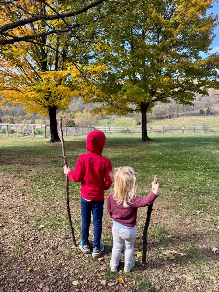 The author's two children on a recent rural outing to pick apples and hike.
