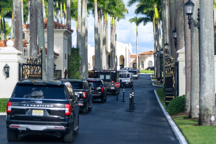 The motorcade for President Donald Trump arrives at Trump International Golf Club on Nov. 26 in West Palm Beach, Florida.