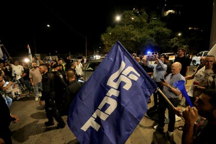 Protest outside the home of former Military Advocate General Yifat Tomer-Yerushalmi in central Israel, on Saturday. Protest outside the home of former Military Advocate General Yifat Tomer-Yerushalmi in central Israel, on Saturday.
