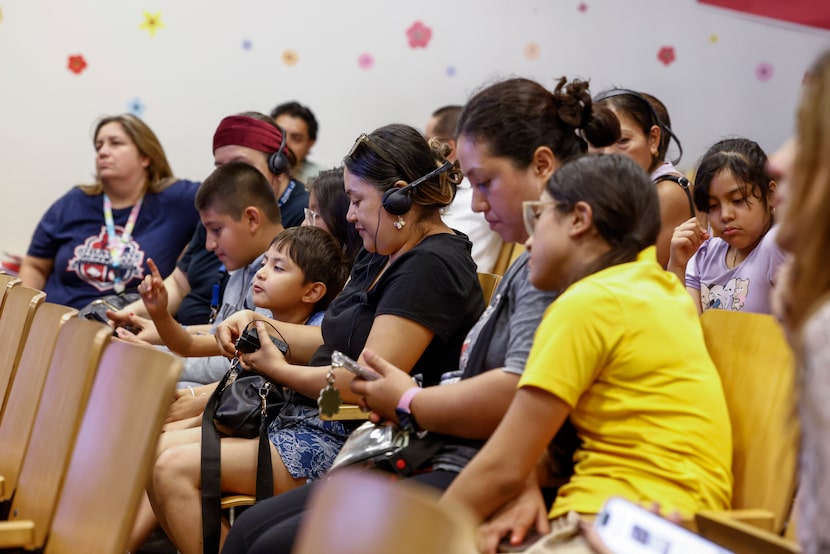 Families of students that attend Obadiah Knight Elementary respond to survey questions on...