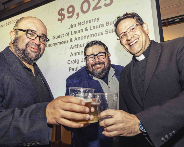 Co-Chairs Dan Garcia and Brother Joe Garcia pose with Former Interim President the Rev. Dempsey Rosales Acosta S.S.L., S.T.D.
