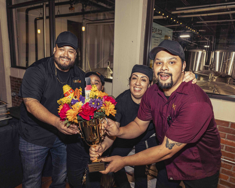 People's Choice Award Winner La Viva celebrate their award for their La Pina Fuego taco.
