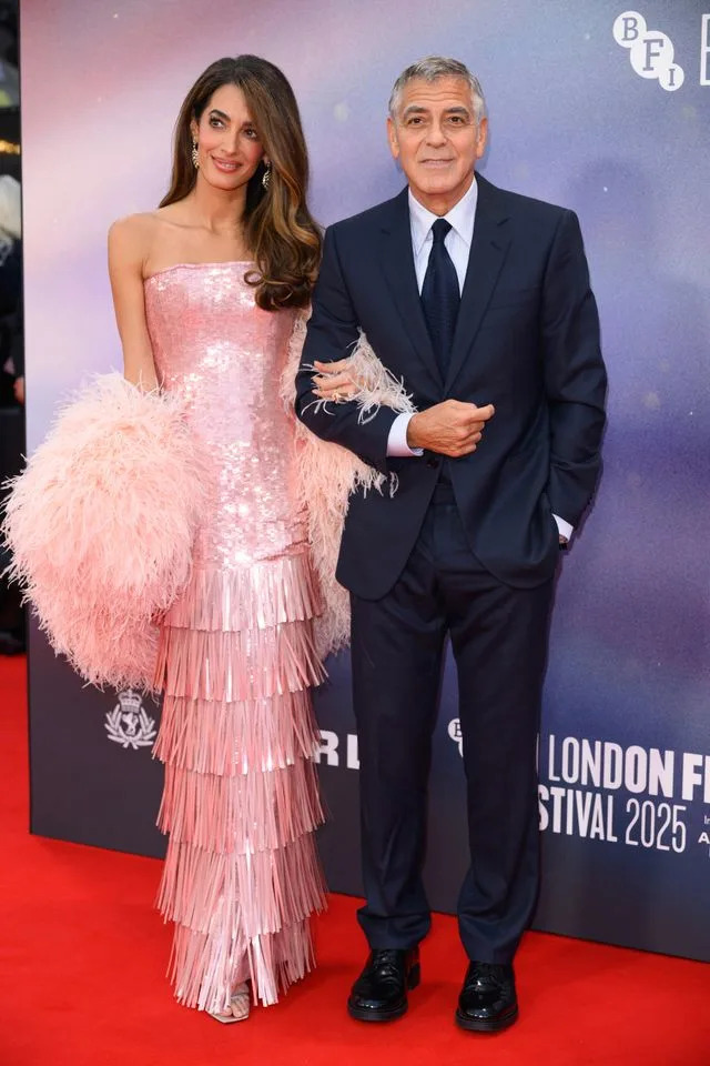 Getty Images Amal Clooney and George Clooney attend the