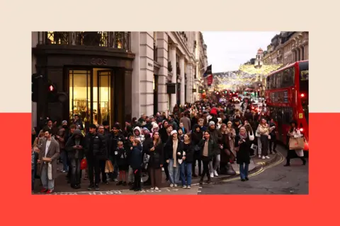 Getty Images Christmas lights and shoppers in London 