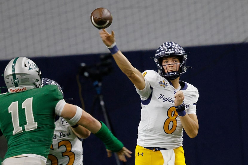 Highland Park's quarterback Buck Randall (8) passes under pressure of Frisco Reedy's Preston...