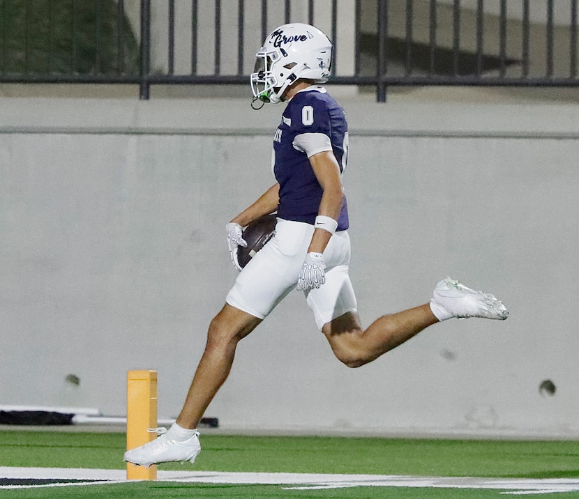 Prosper Walnut Hill wide receiver Zaiden Crain (0) scores the games first touchdown during...