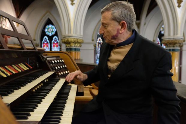 Father Antenici photographed at Visitation of the Blessed Virgin Mary. (Emma Seiwell/ New York Daily News)