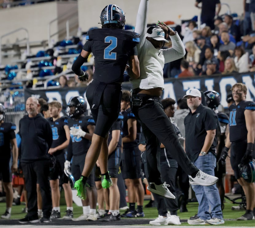Prosper Rock Hill receiver Bryce Allen (2) celebrates his fourth touchdown reception with an...