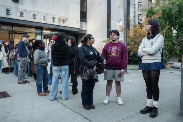 People leave a polling location in New York City during mayoral election on Tuesday, Nov. 4, 2025, in New York. (AP Photo/Olga Fedorova)