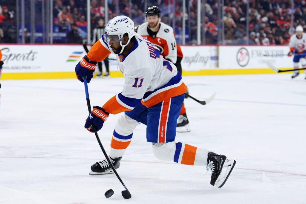 New York Islanders' Anthony Duclair takes a shot during the first period of an NHL hockey game against the Philadelphia Flyers, Saturday, Oct. 25, 2025, in Philadelphia.