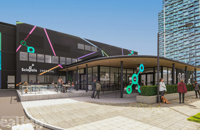 A building saying Sciopolis Imperial with people and a dog in front