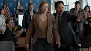 ALL HER FAULT stars Sarah Snook as Marissa, Jake Lacy as Peter, and Michael Peña as Detective Alcaras, shown here leaving a press conference