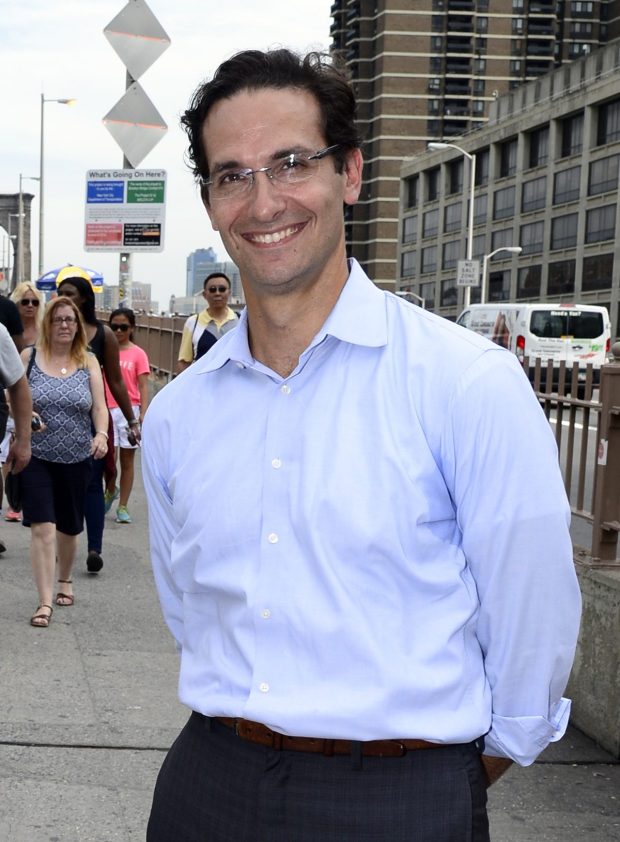 DOT Deputy Commissioner Ryan Russo on the Brooklyn Bridge bike path on Monday, August 8, 2016. (Jefferson Siegel/New York Daily News)