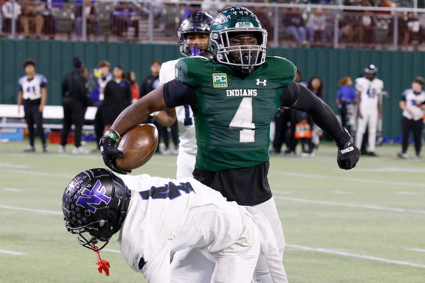 Waxahacie's Taylen Strange (4) reacts after carring the ball against North Forney’s Aayden...