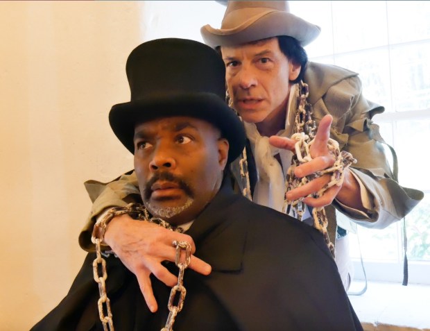 Benjamin Brown, front, and Christopher Patrick Mullen star in "A Christmas Carol Comedy" at Hedgerow Theatre in November 2022. (COURTESY OF HEDGEROW THEATRE)