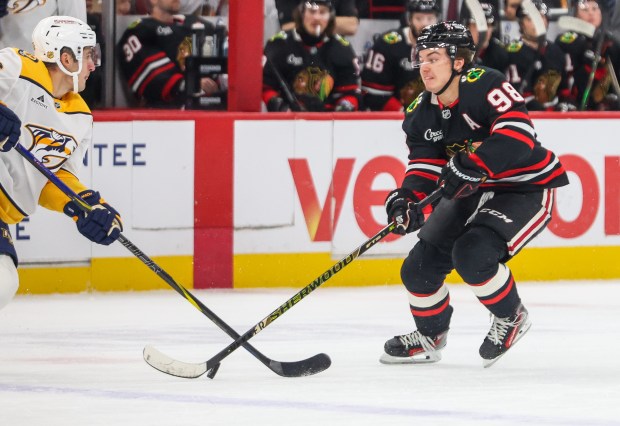 Blackhawks center Connor Bedard handles the puck during the first period against the Nashville Predators, Nov. 28, 2025, at the United Center. (Dominic Di Palermo/Chicago Tribune)