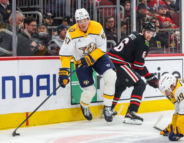 Nashville Predators right wing Michael McCarron (47) handles the puck during the second period against the Blackhawks, Nov. 28, 2025, at the United Center. (Dominic Di Palermo/Chicago Tribune)