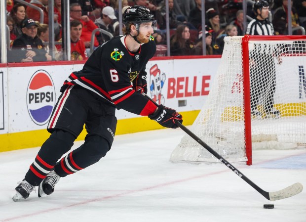 Blackhawks defenseman Sam Rinzel (6) handles the puck during the second period against the Nashville Predators, Nov. 28, 2025, at the United Center. (Dominic Di Palermo/Chicago Tribune)