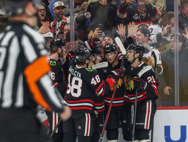 The Blackhawks celebrate Blackhawks center Ryan Donato's goal that brought the score 1-0 during the first period against the Nashville Predators, Nov. 28, 2025, at the United Center. (Dominic Di Palermo/Chicago Tribune)